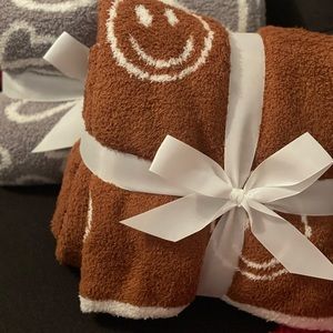 Smiley face fleece blanket